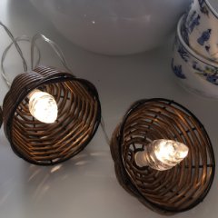 Light chain with hoods made of rattan